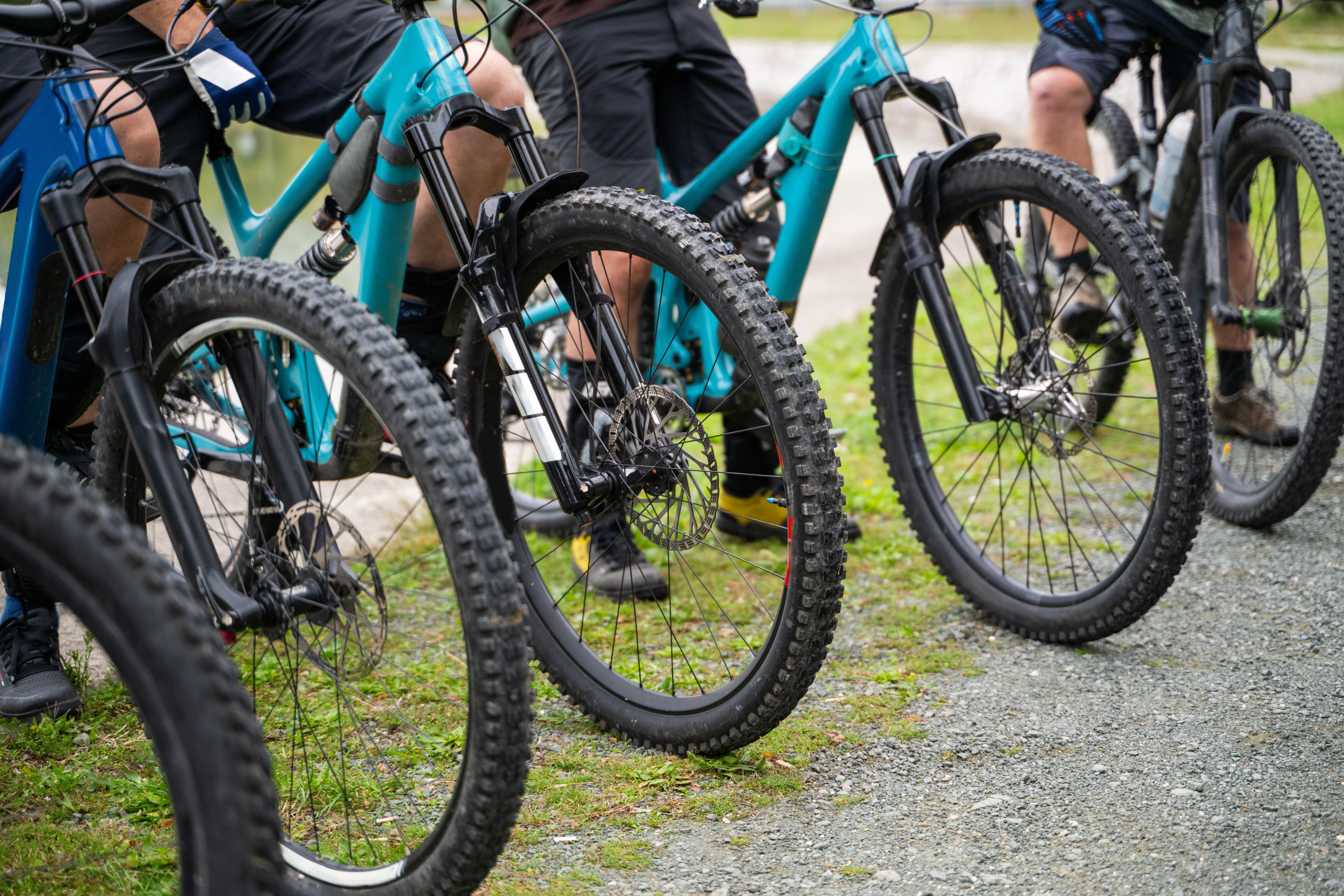 Close-up of bike wheels, a major factor in a bike's price