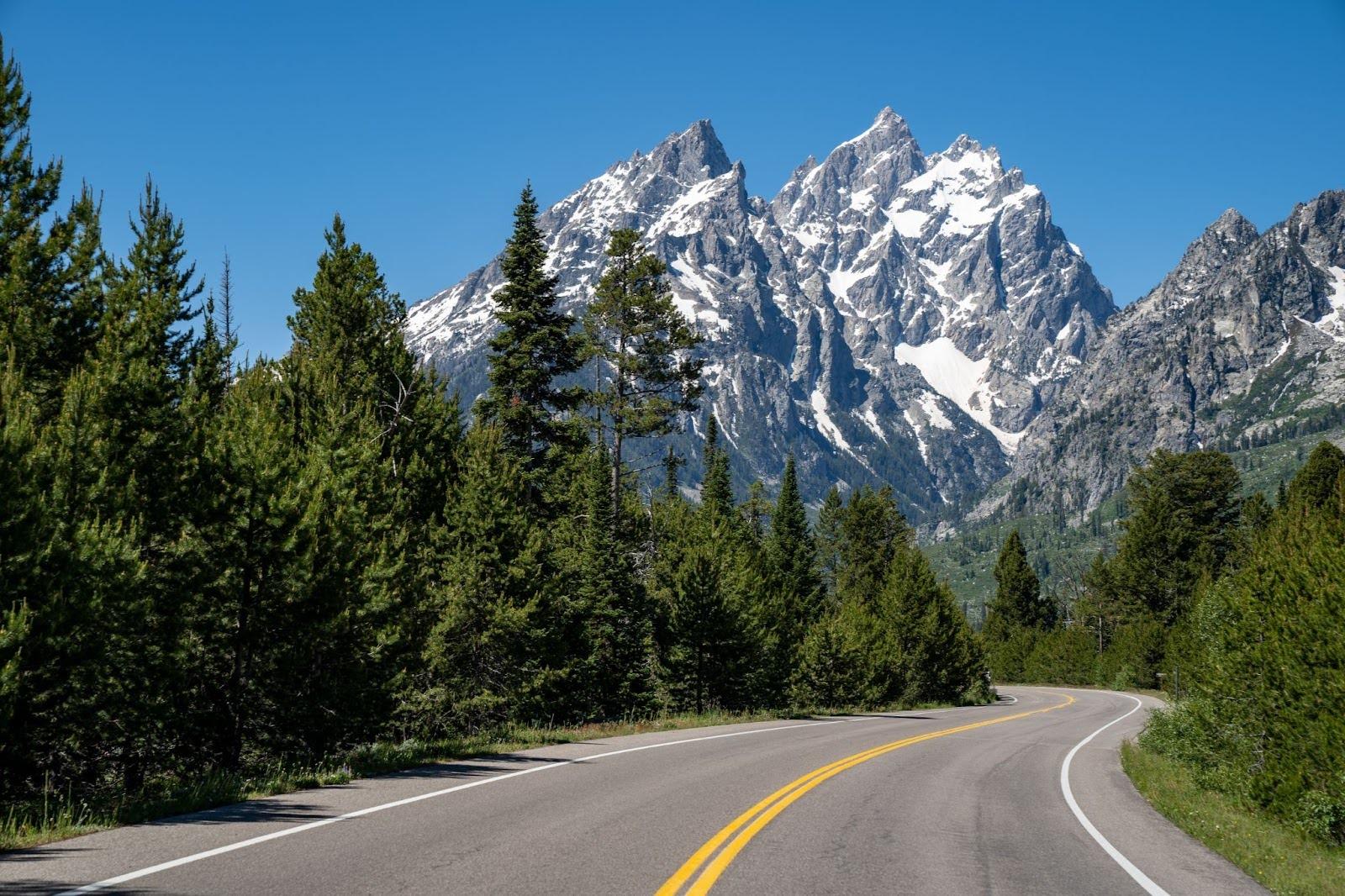 The skyline of Grand Teton dwarfs you in a way that makes the ride feel epic but still easy.