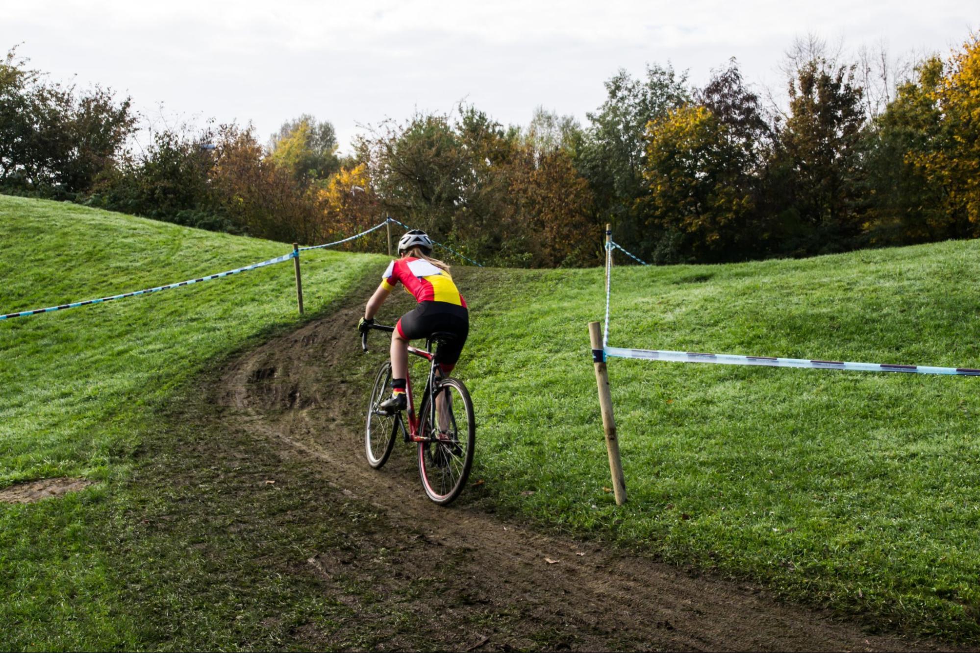 Cyclocross rider practising cornering and remounts under fatigue during a training session