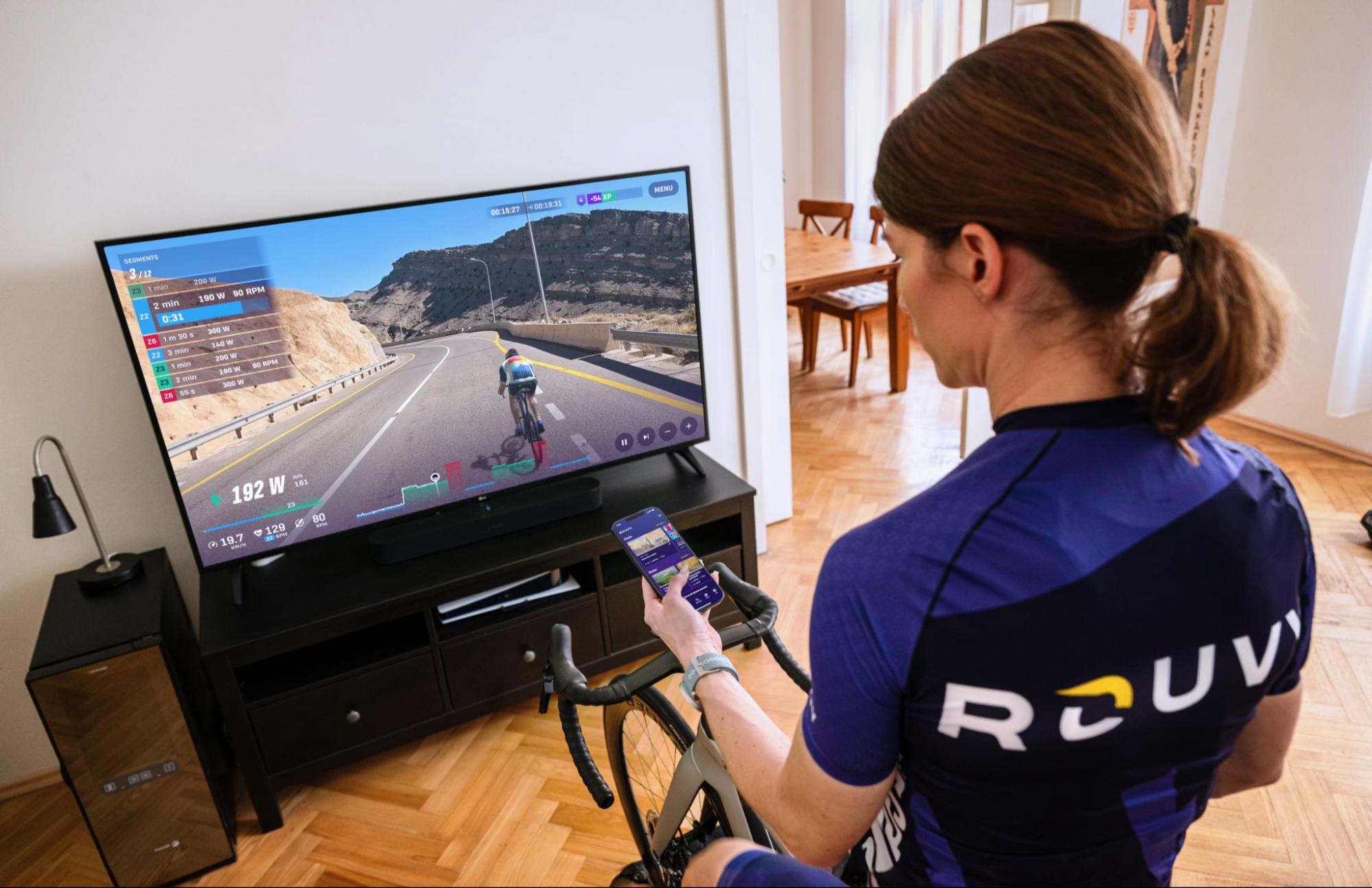 Indoor cyclist using ROUVY structured workout on a smart trainer