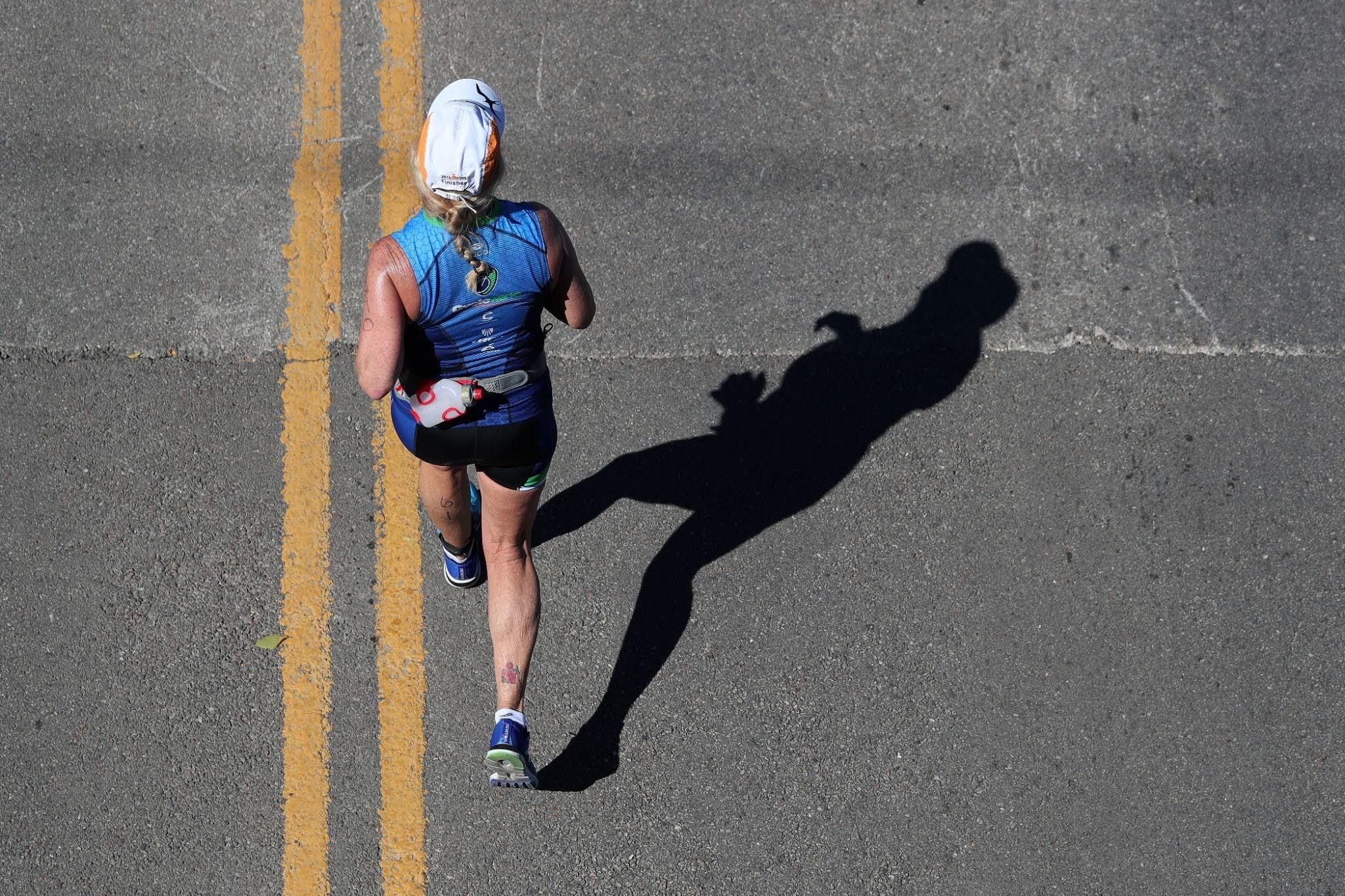 Female triathlete racing in a tri suit