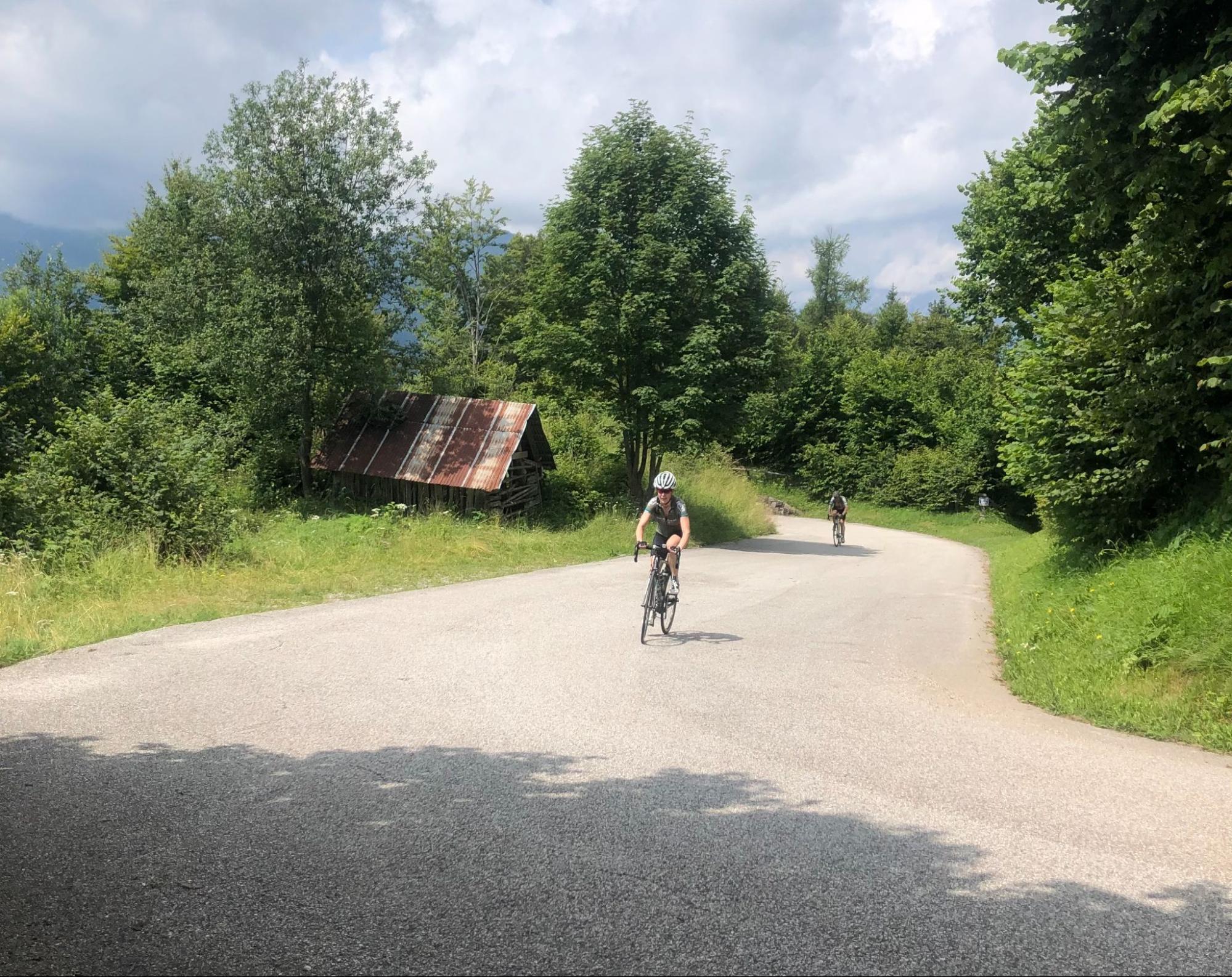 Cyclist riding uphill on a mountain road