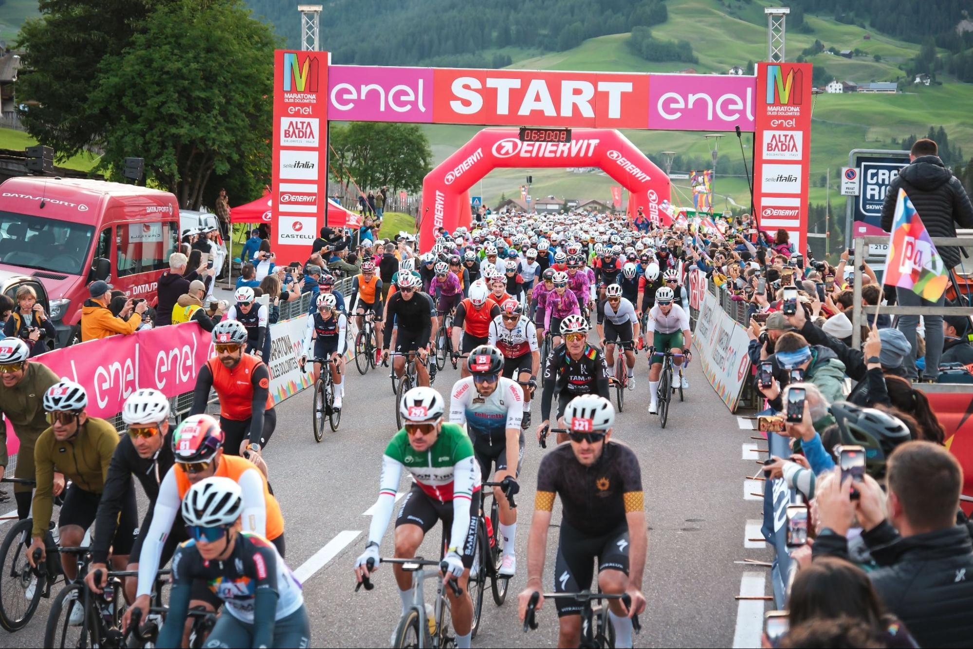 Riders setting off over the Dolomites passes during the Maratona dles Dolomites