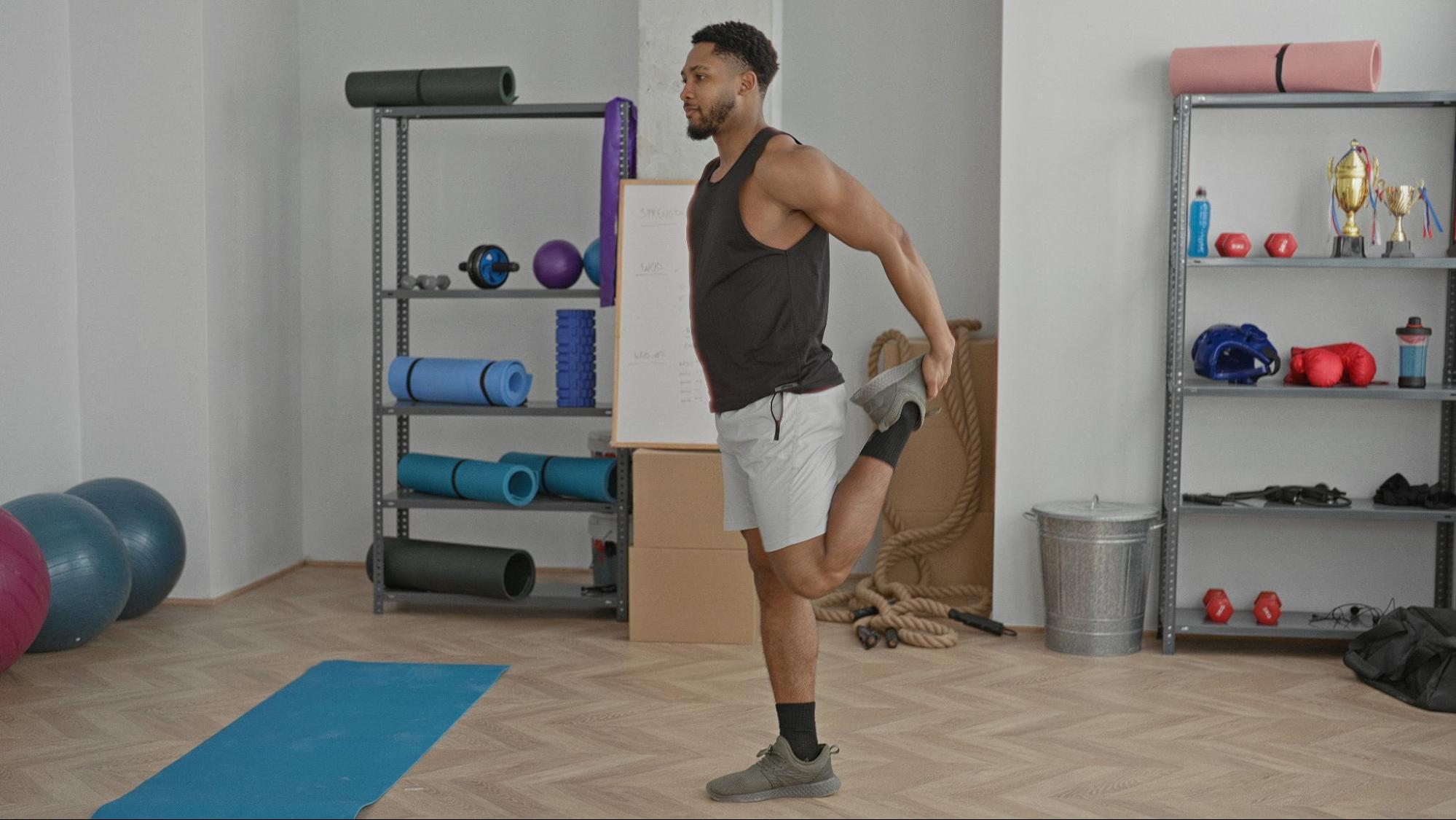 Standing quadriceps stretch after cycling for tight thighs