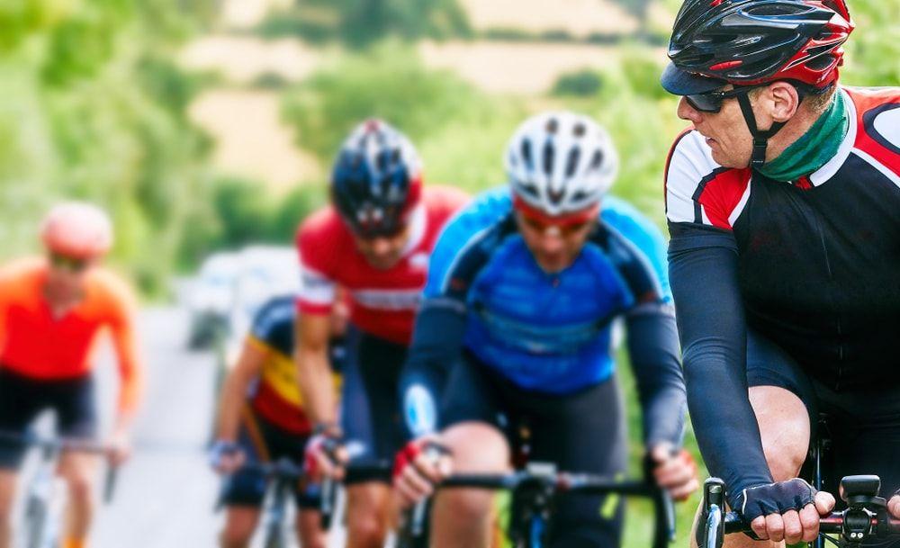 group ride of male cyclists.jpeg